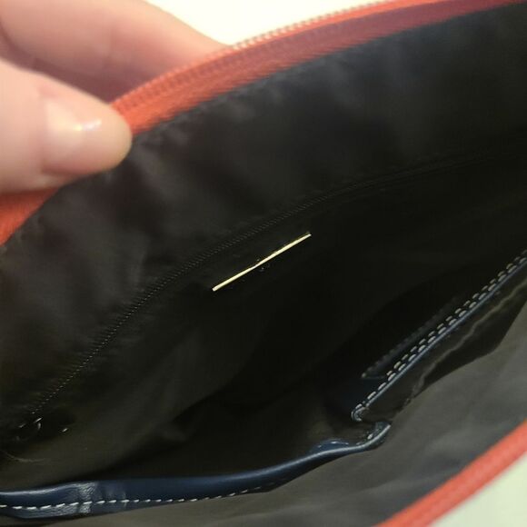 Stylish Crossbody Bag with Red and Blue Accents - Picture 14 of 15